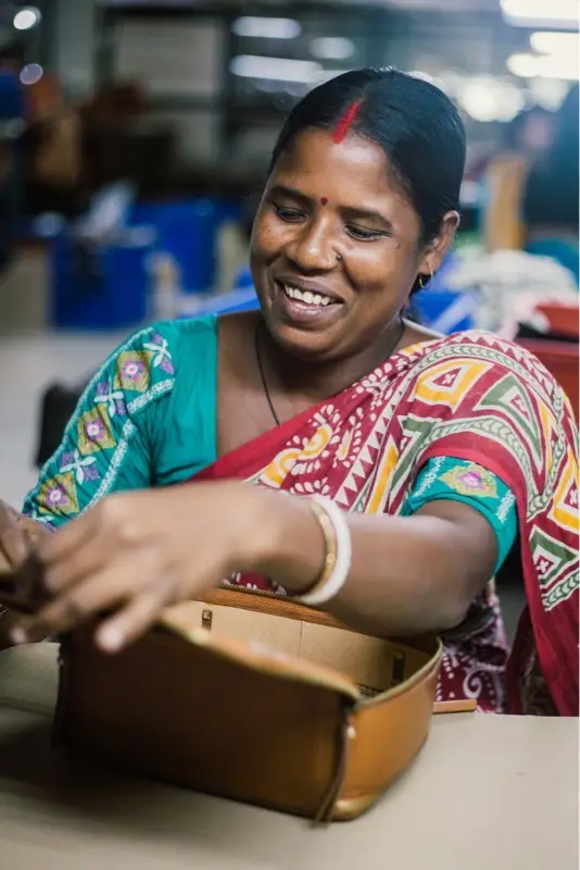 Women in business producing fair trade bags