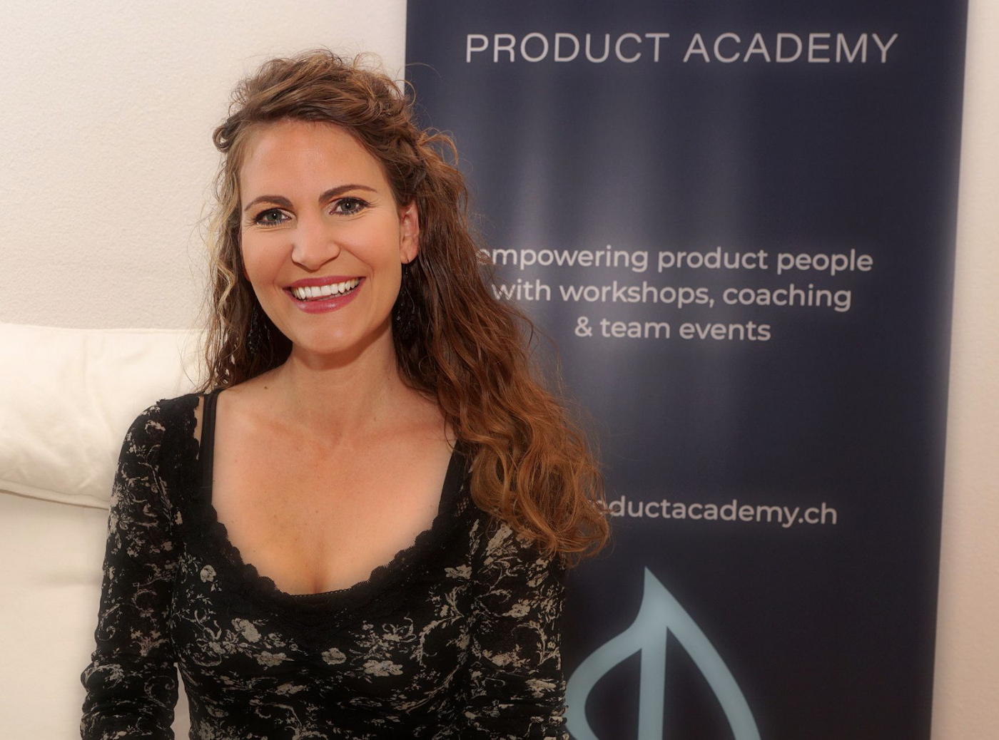 Entrepreneur Tanja Lau with Product Academy Sign