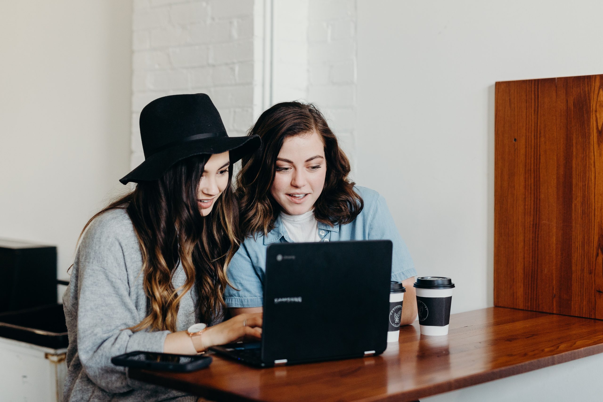 Two women at laptop